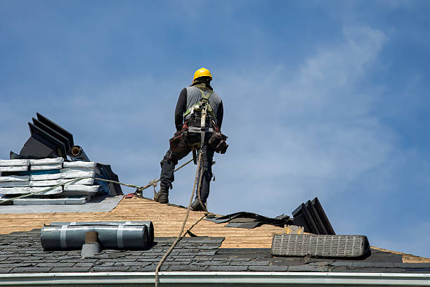 Professional Roofing technician working in South Hamilton, MA